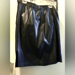 (Leather) Genuine Black Leather skirt. Midi length